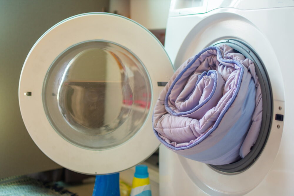 kan een dekbed in de wasmachine